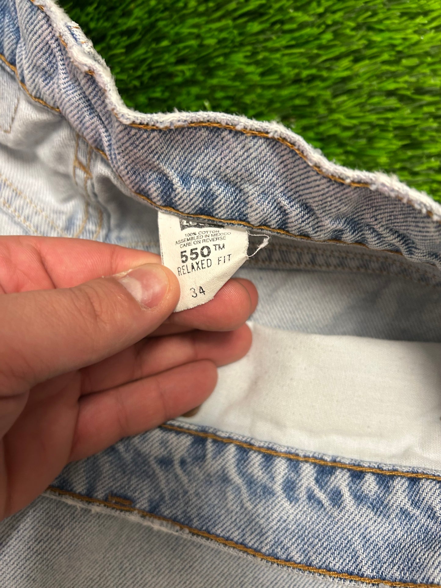 1996 Vintage Levi's 550 Light Blue Distressed Jean Shorts (34)