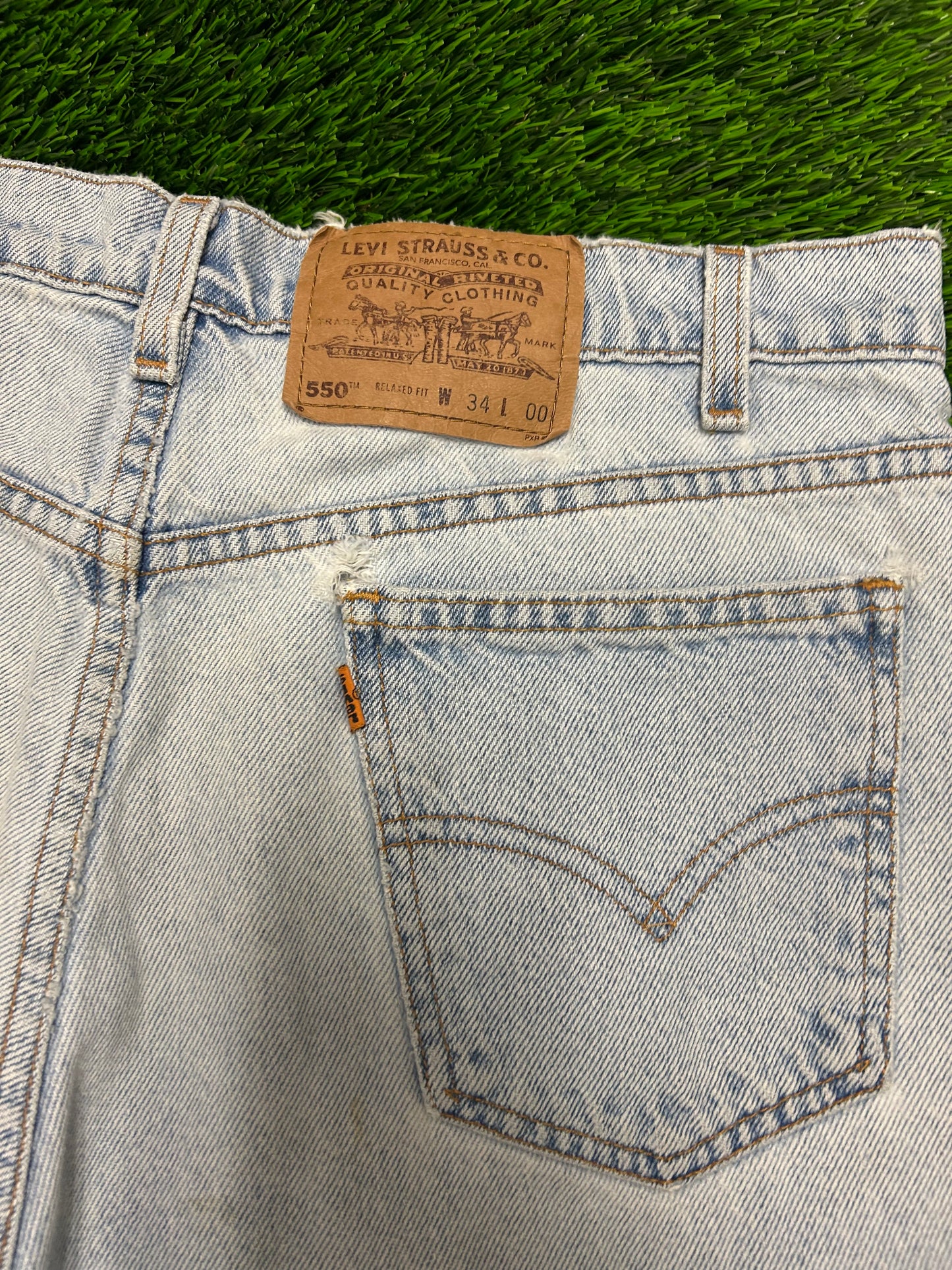 1996 Vintage Levi's 550 Light Blue Distressed Jean Shorts (34)