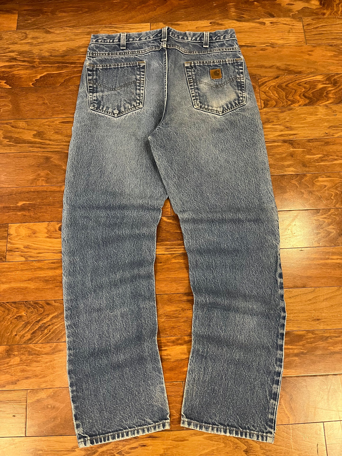 2009 Carhartt Faded Blue Jeans (34 x 34)
