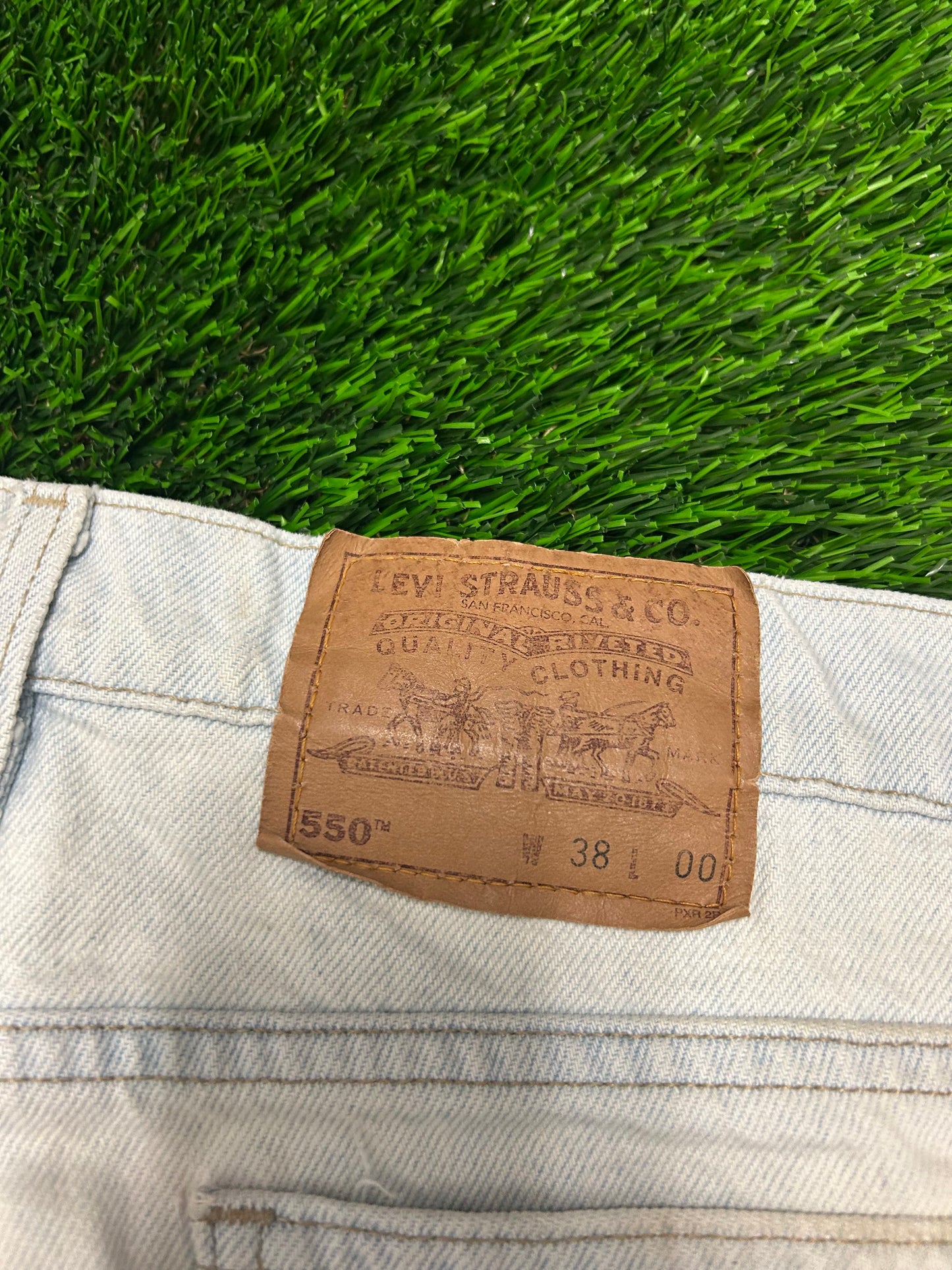 1994 Vintage Levi's 550 Orange Tab Faded Light Wash Jean Shorts (38)