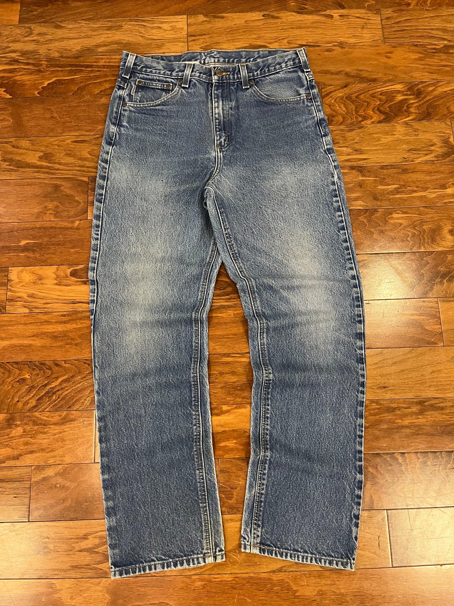 2009 Carhartt Faded Blue Jeans (34 x 34)