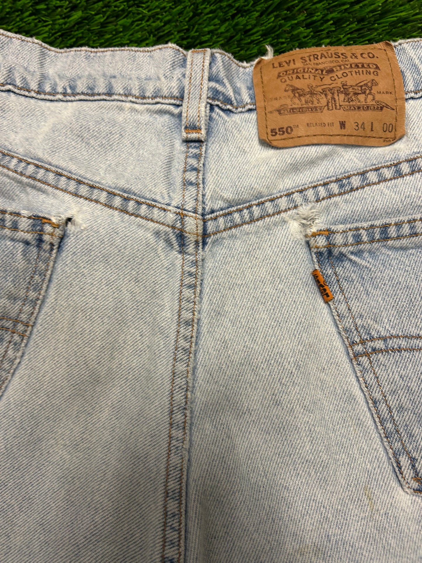 1996 Vintage Levi's 550 Light Blue Distressed Jean Shorts (34)