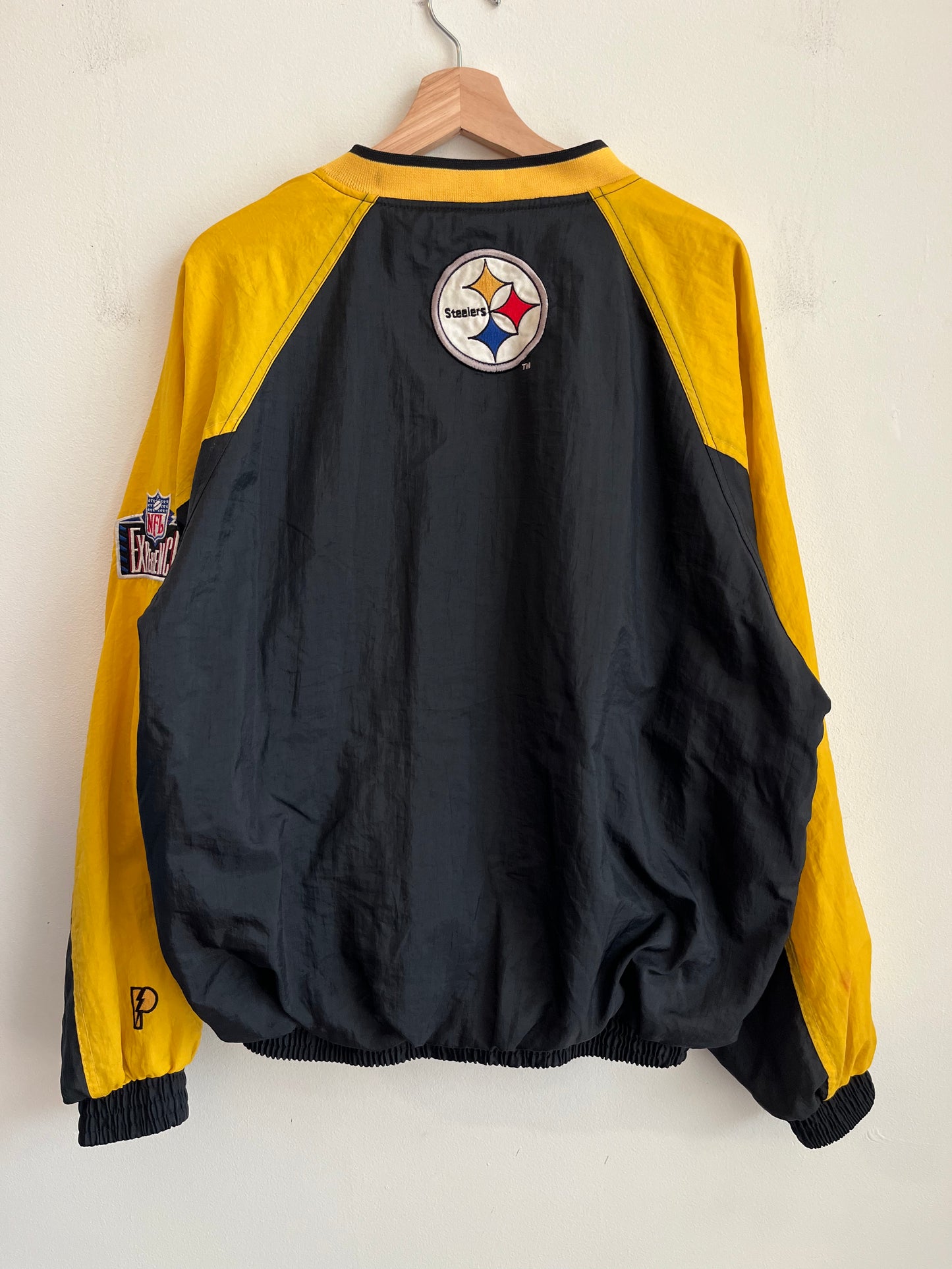 1990s Pittsburgh Steelers Pro Player Two Tone Spell Out Windbreaker (M)